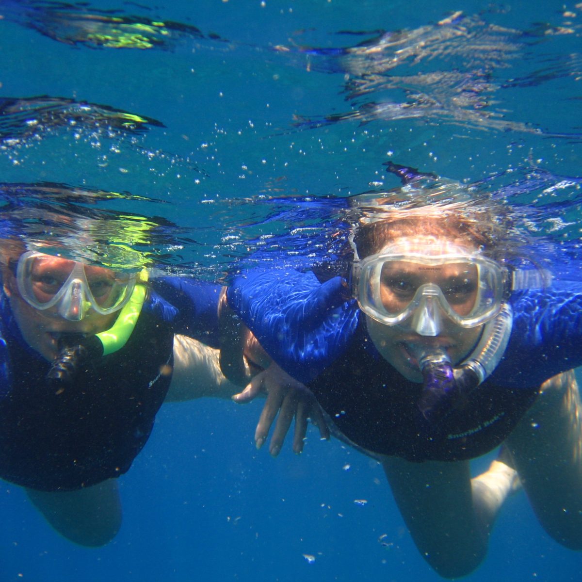a person swimming in a pool of water